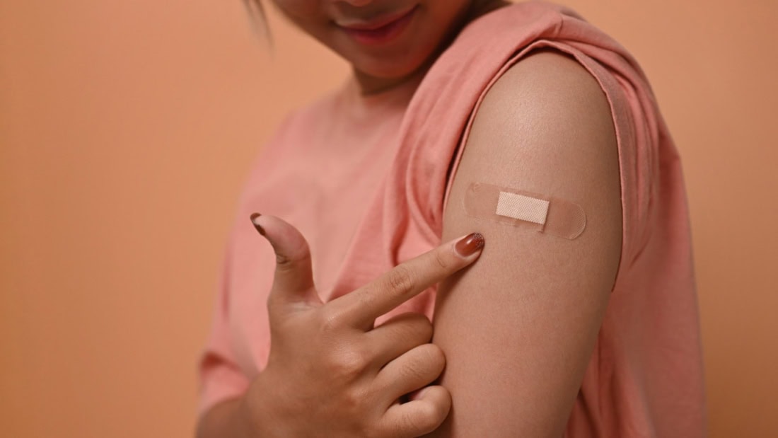 Vaccination on the arm for travel, healthcare, vaccination schedule, medical preparation.
